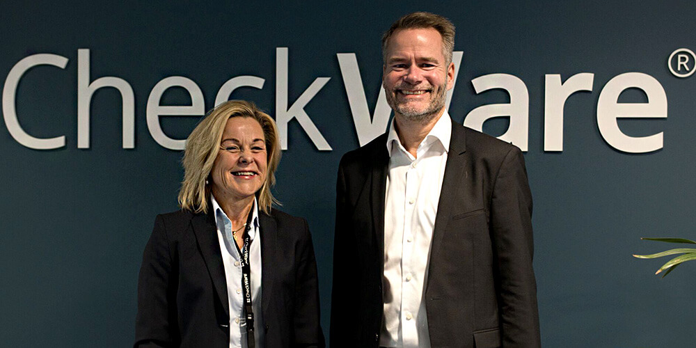 CheckWare joins EG to improve healthcare in the Nordics - woman with tablet